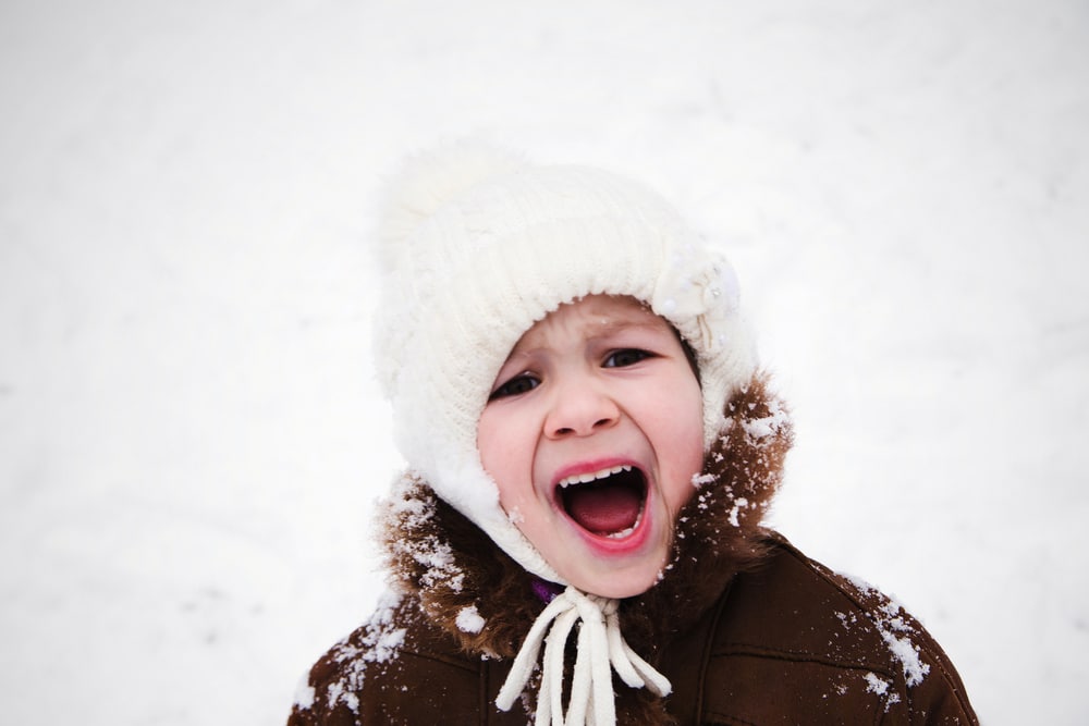 little girl in winter yell