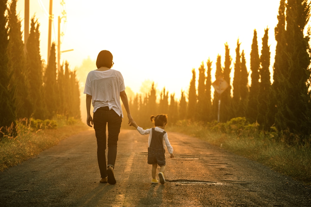 mother walking with daughter