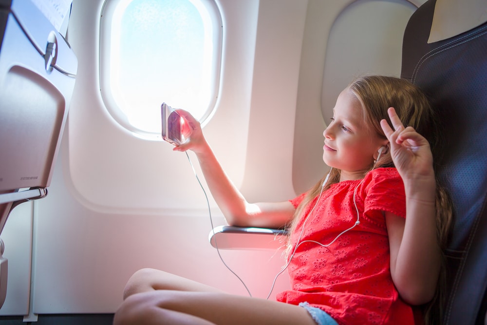 girl travel airplane