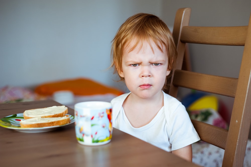 kid angry at breakfast