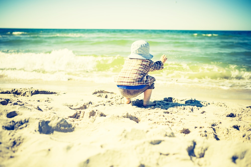 kid on beach vintage