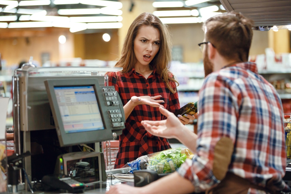 angry woman at cashier