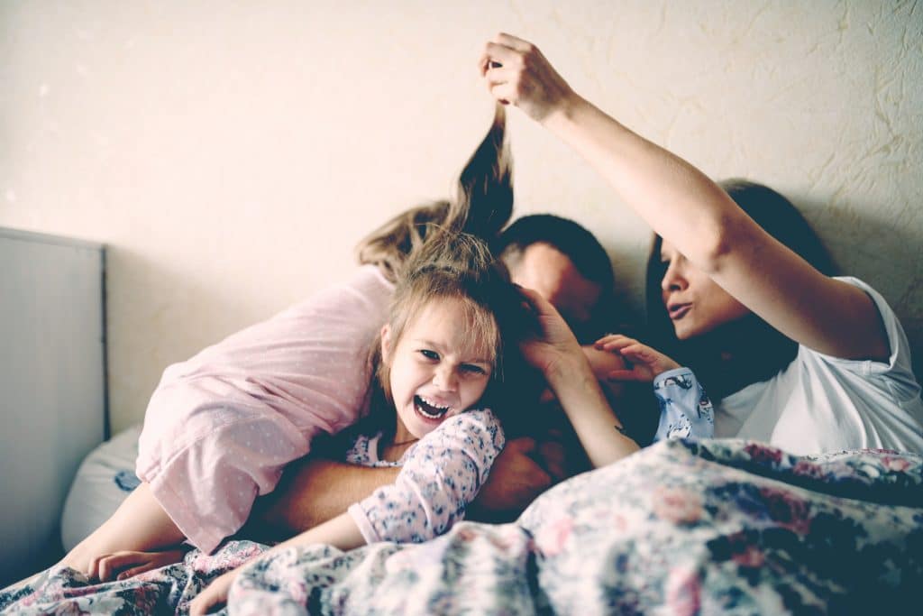 family in bed