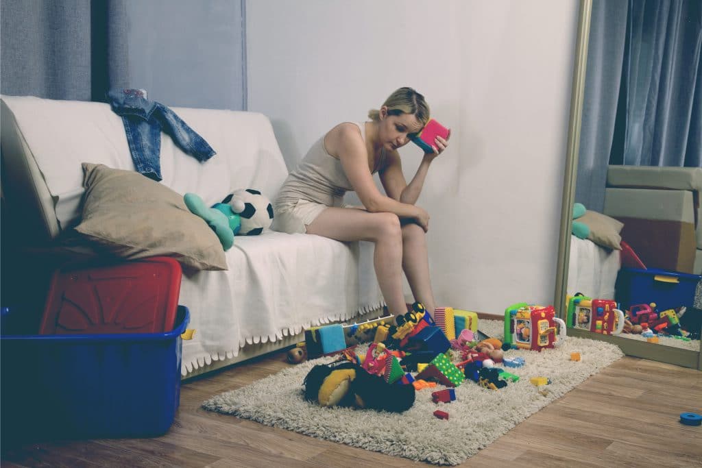 stressed mother in living room