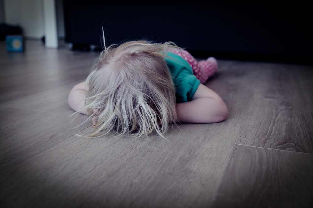 toddler cry on the floor