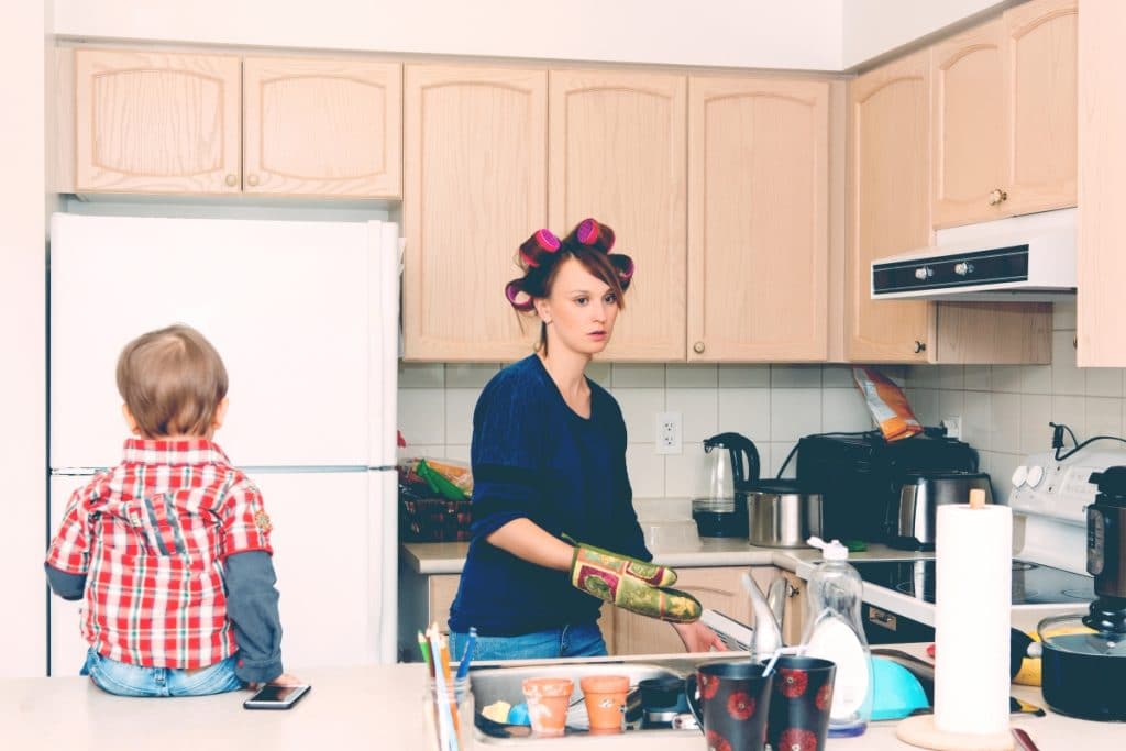 overwhelmed mother in kitchen